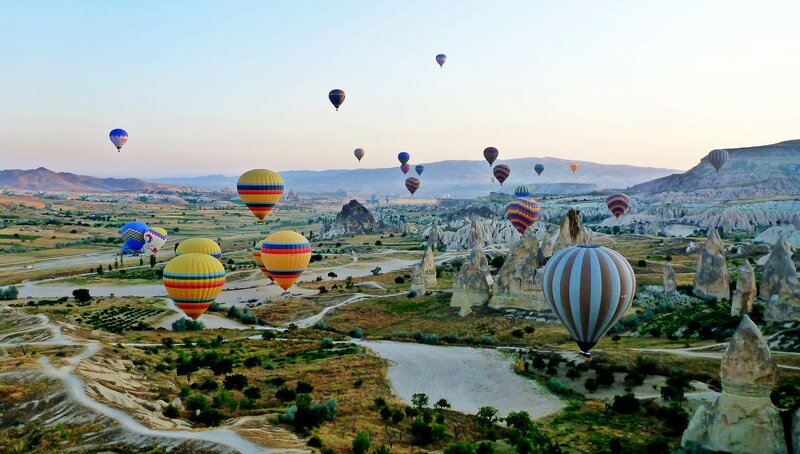 Hot Air Balloons over Landscape — Yellow, Serene