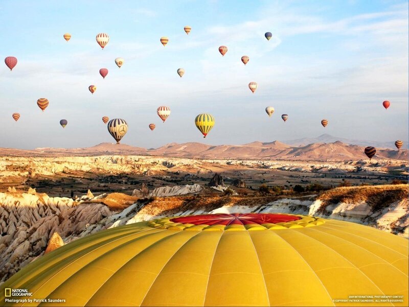 Hot Air Balloons over Landscape — Yellow