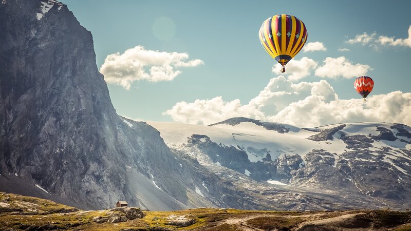Hot Air Balloons over Mountains — Blue, Serene, Afternoon, Photograph, Clouds