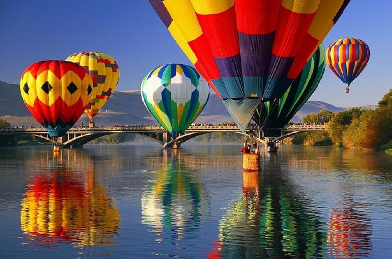 Hot Air Balloons over River — Blue, Serene