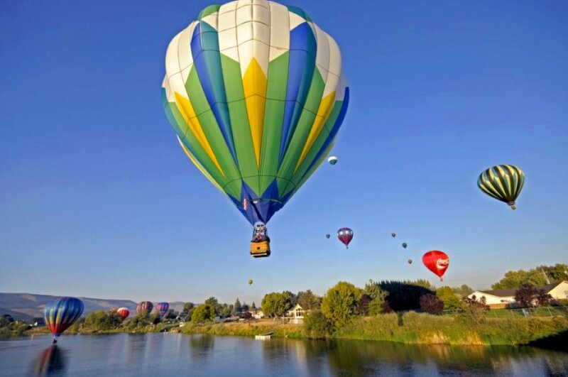 Hot Air Balloons over River — Blue