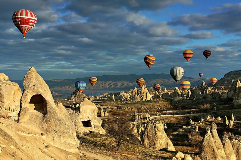 Hot Air Balloons over Rock Formations — Blue