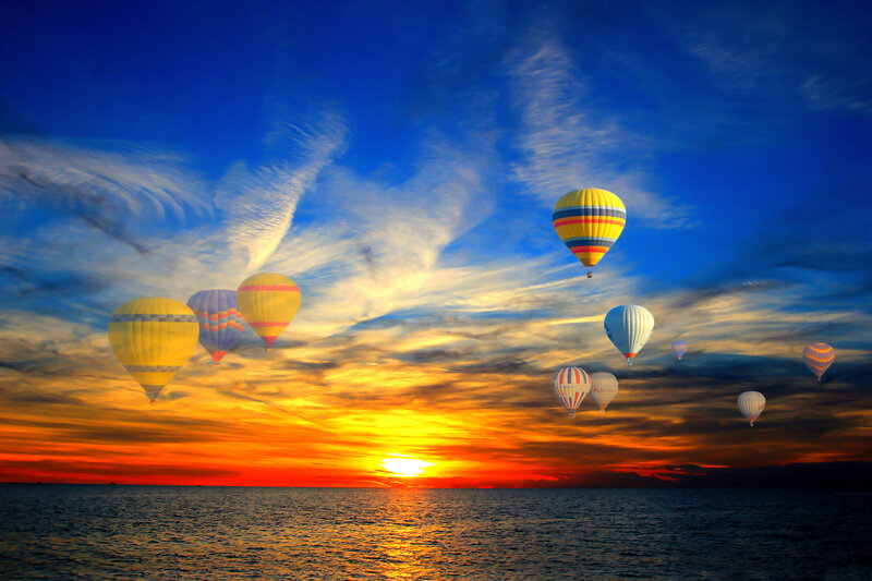 Hot Air Balloons over Sea — Blue, Dramatic, Sunset