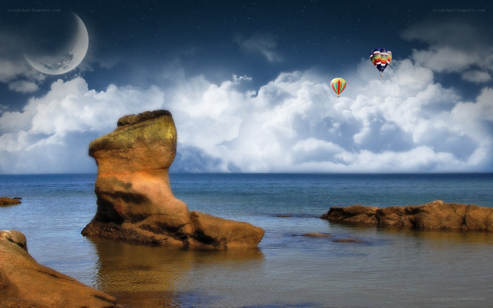 Hot air balloons over sea rocks