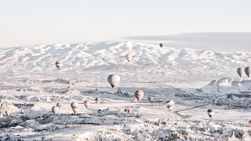 Hot Air Balloons over Snow