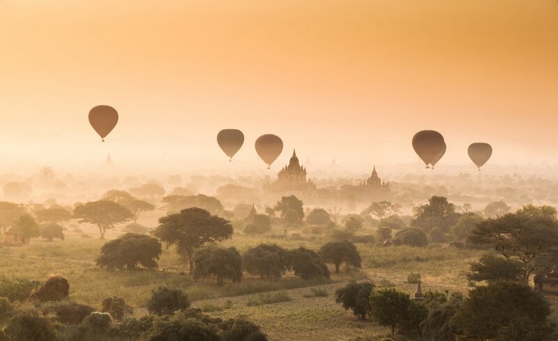 Hot Air Balloons over Temples — Orange, Serene, Sunrise