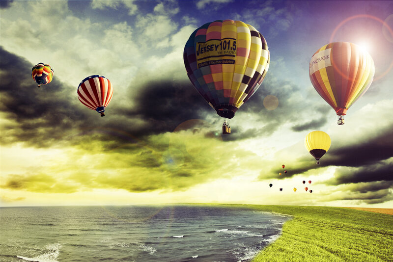 Hot air balloons over the coast