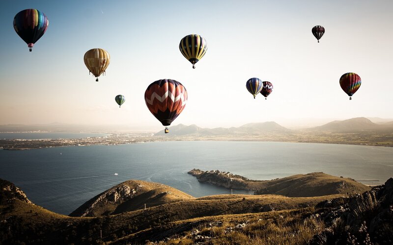 Hot air balloons over the sea
