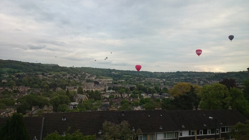 Hot Air Balloons over Town — Gray