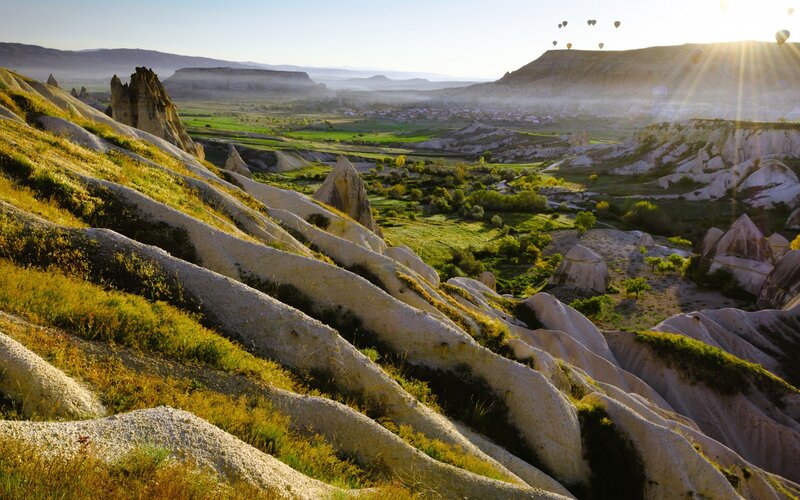 Hot Air Balloons over Valleys