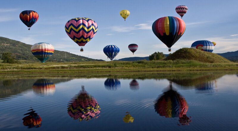 Hot Air Balloons over Water — Blue, Serene
