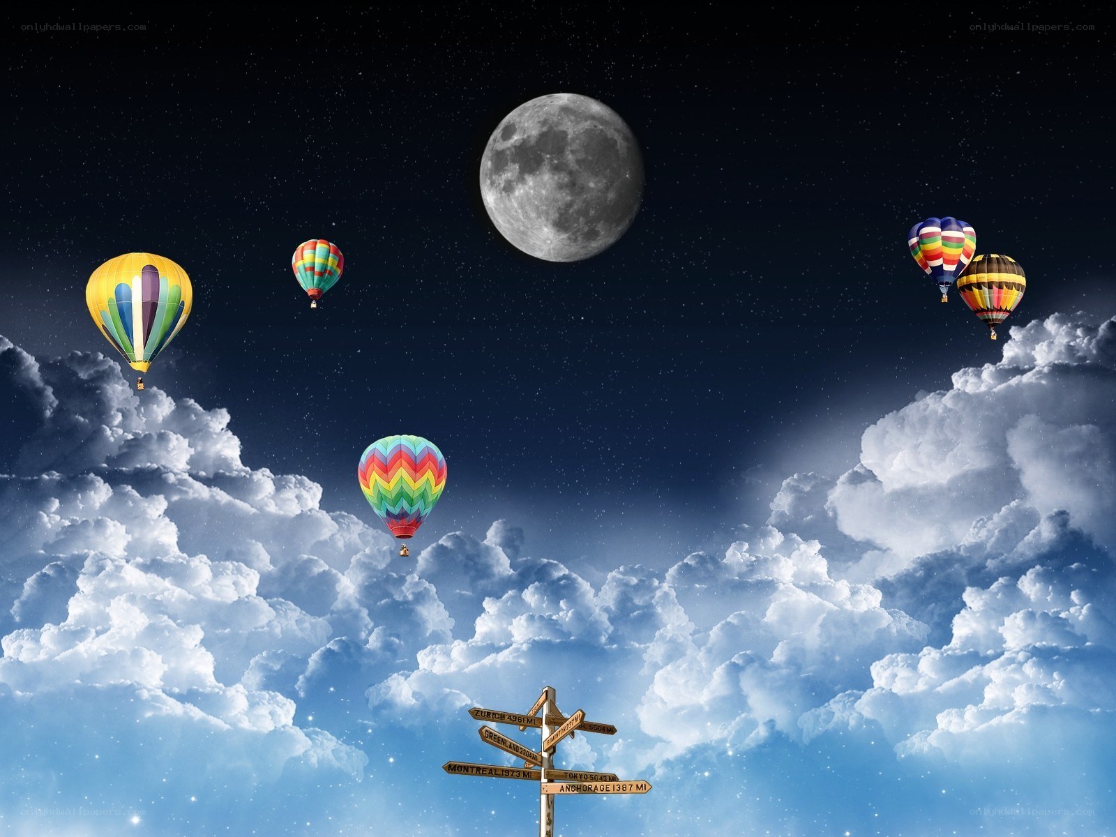 Hot air balloons under moonlight