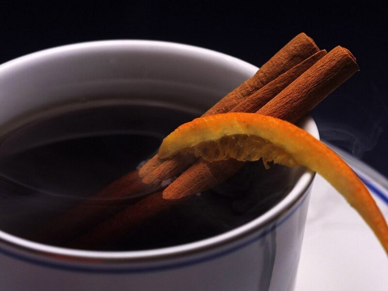 Hot drink with cinnamon and orange