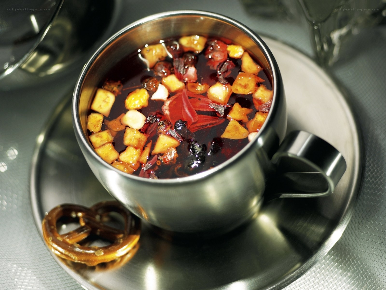 Hot fruit drink in metal cup