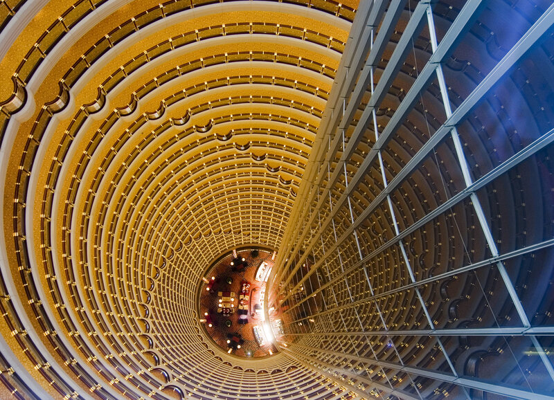 Hotel Atrium Interior — Gold, Dramatic