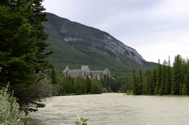 Hotel by River and Mountain