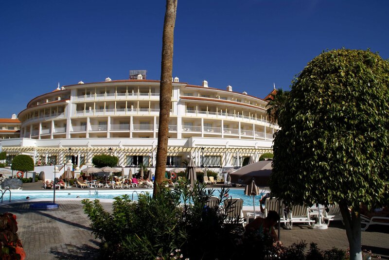 Hotel by the pool on a sunny day