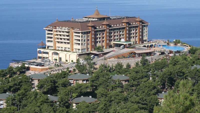 Hotel on Coastal Cliff — Blue