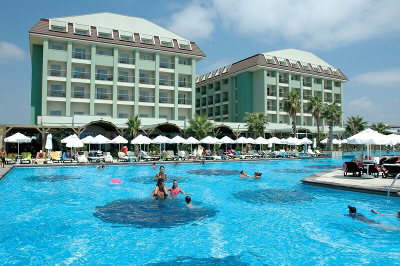 Hotel pool with guests