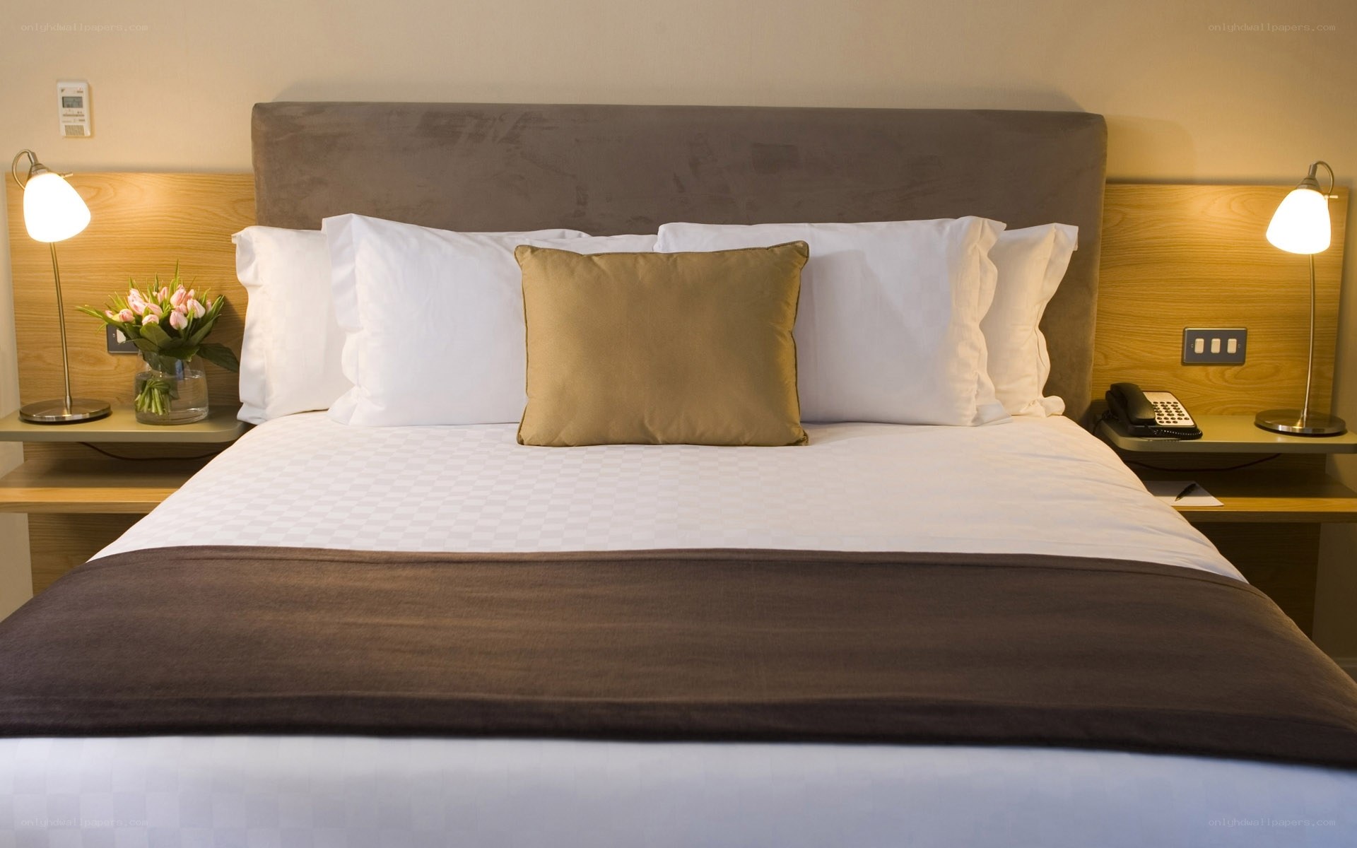hotel room bed with pillows