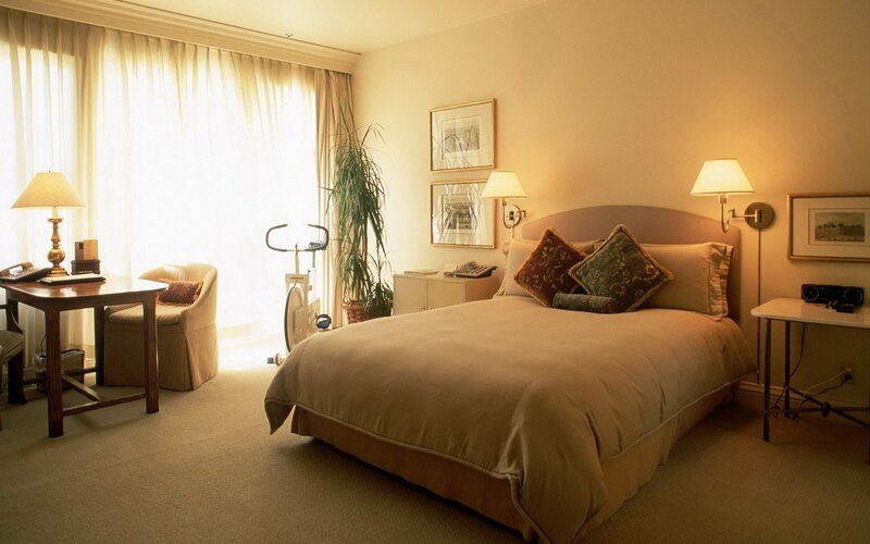 hotel room with bed and desk