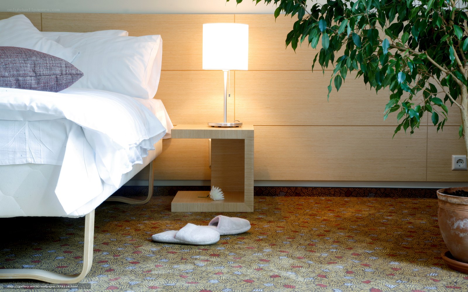 hotel room with bed and lamp