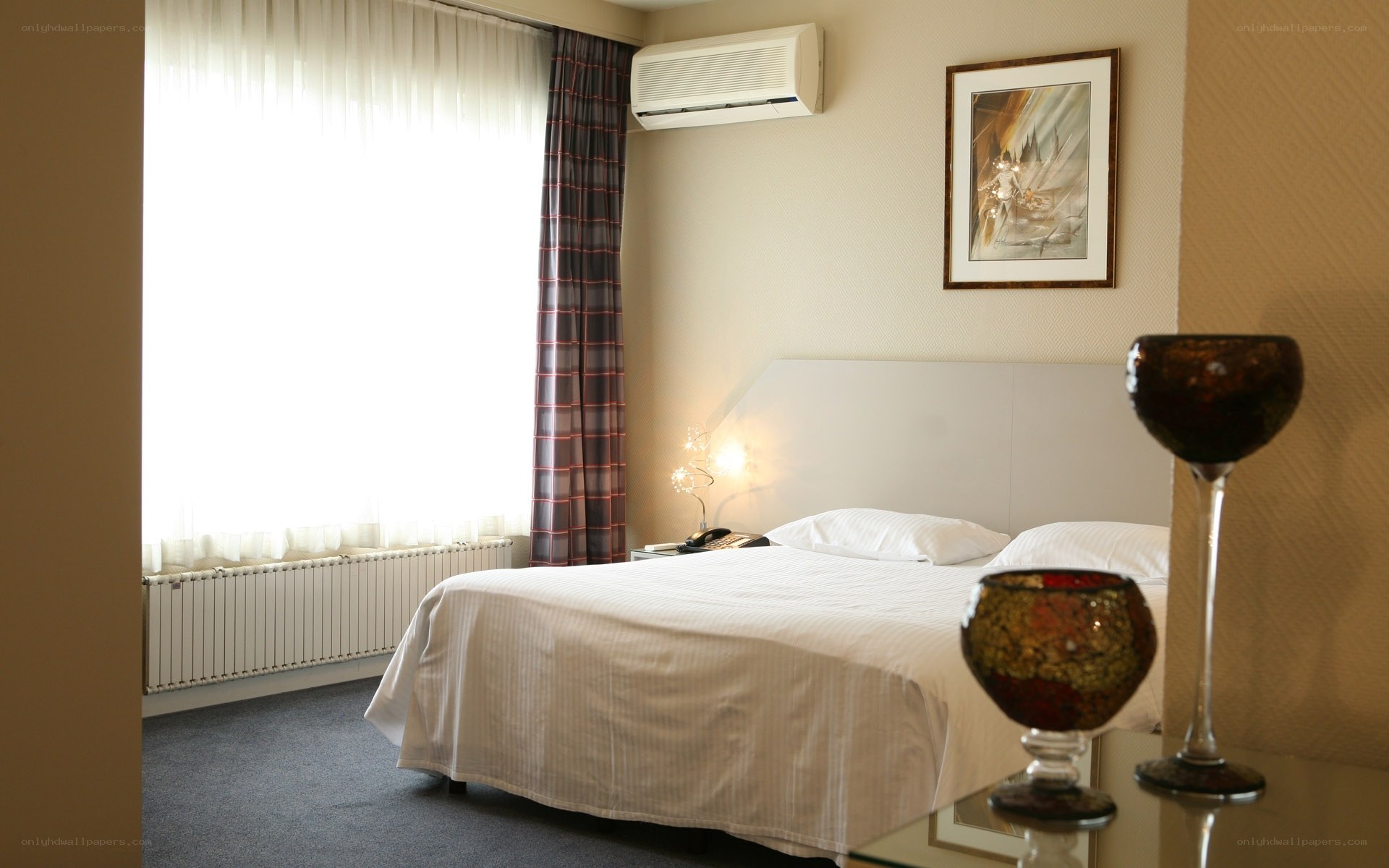 hotel room with bed and window