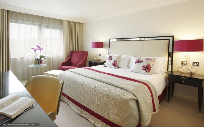 hotel room with floral bedding