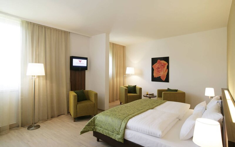 hotel room with green accents