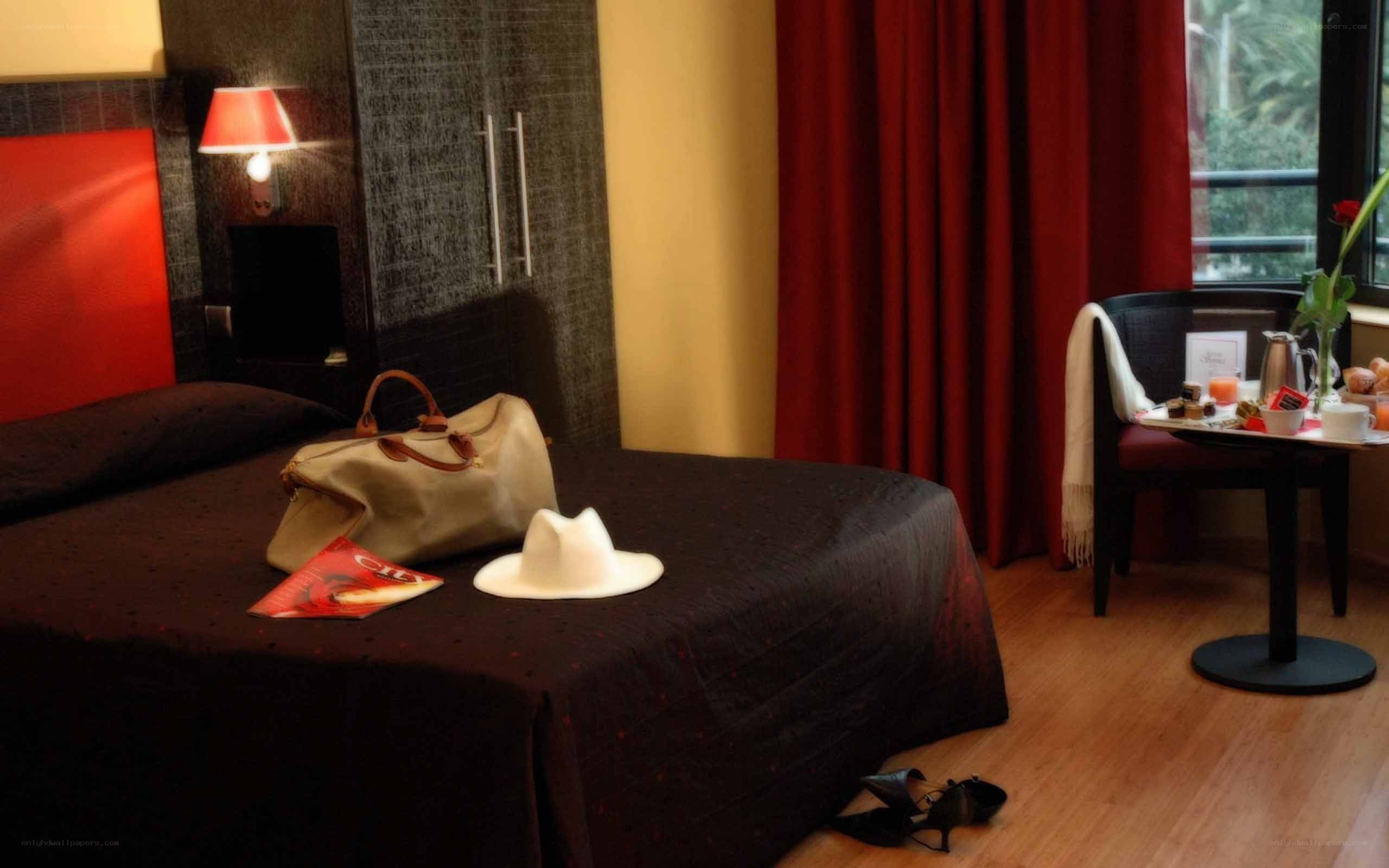 Hotel room with red accents