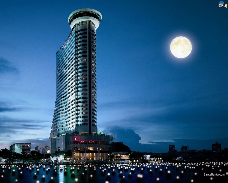Hotel tower under full moon