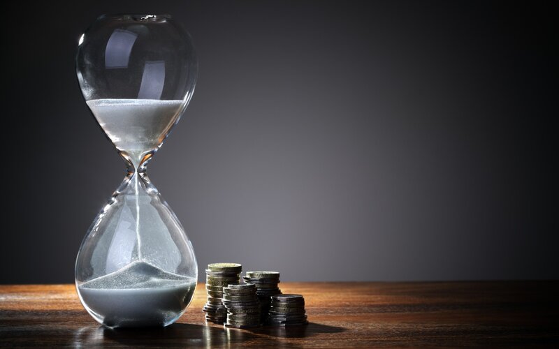 Hourglass and Coin Stacks