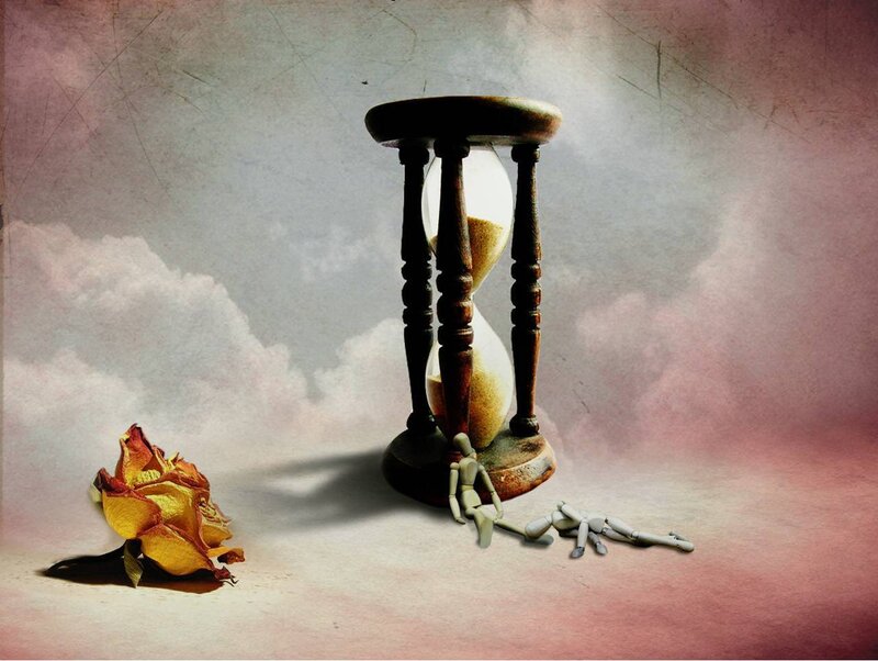 Hourglass with dried rose and figure