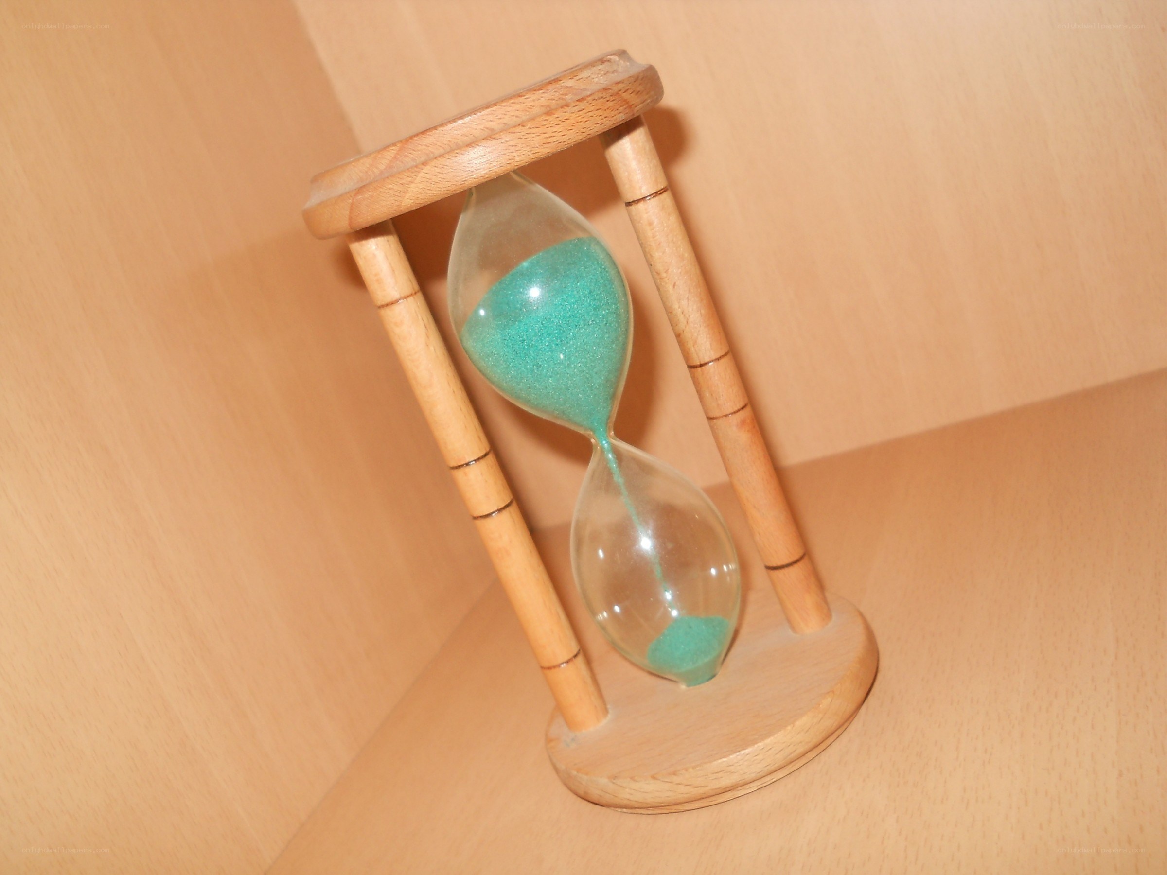hourglass with green sand