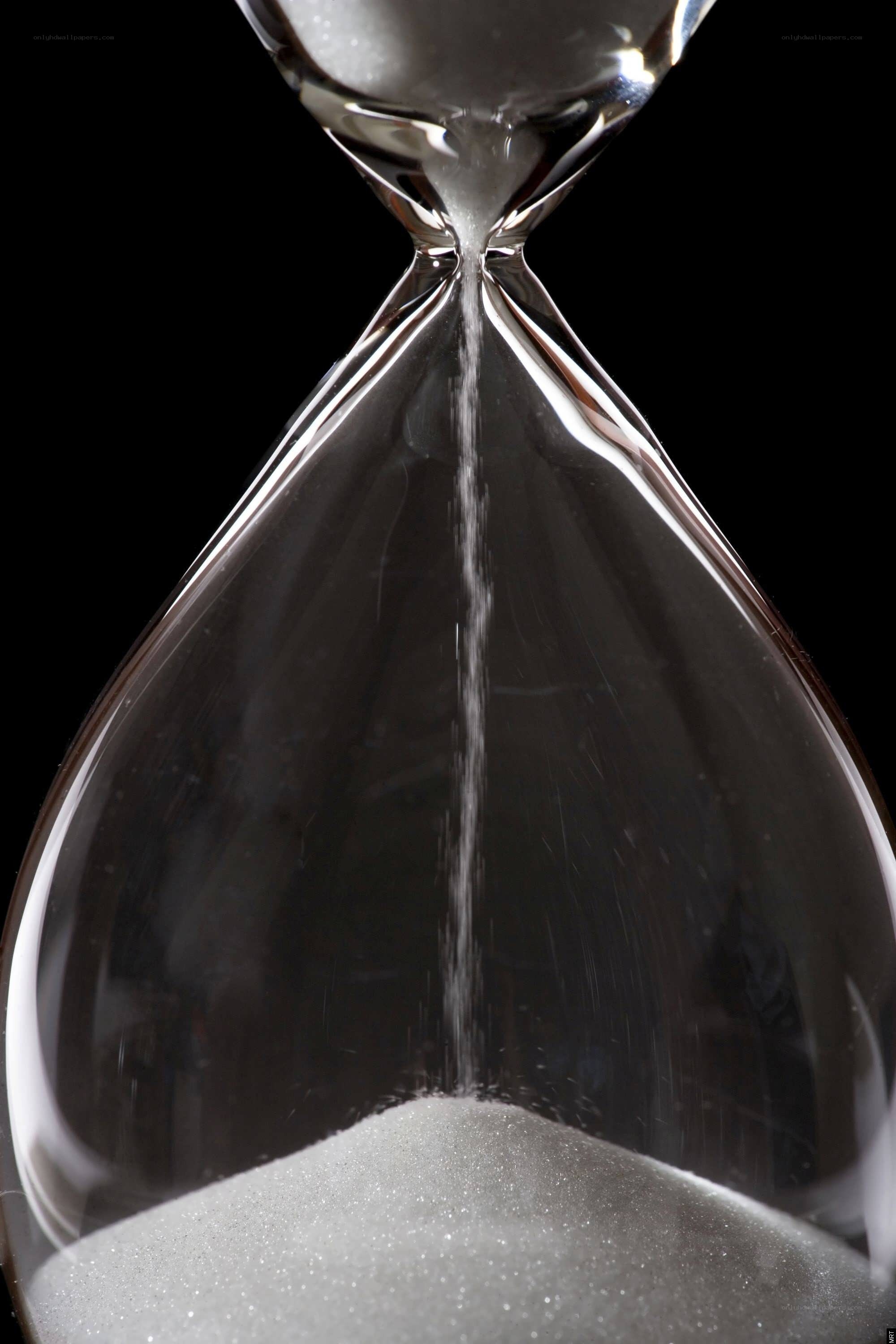hourglass with sand falling