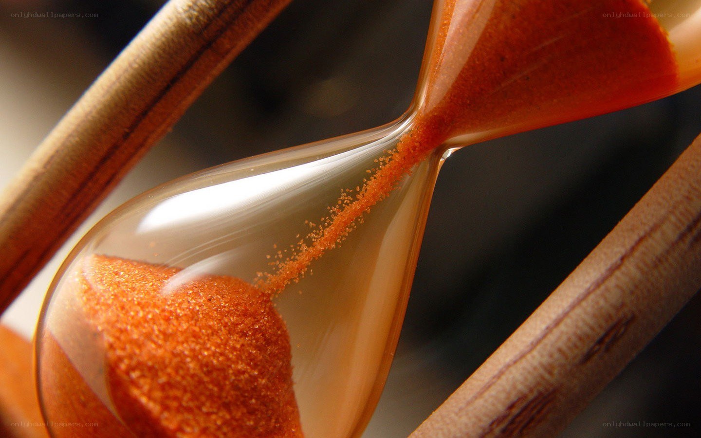Hourglass with sand flowing