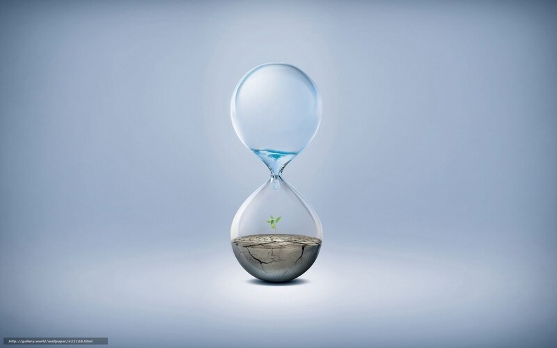 Hourglass with sprouting plant