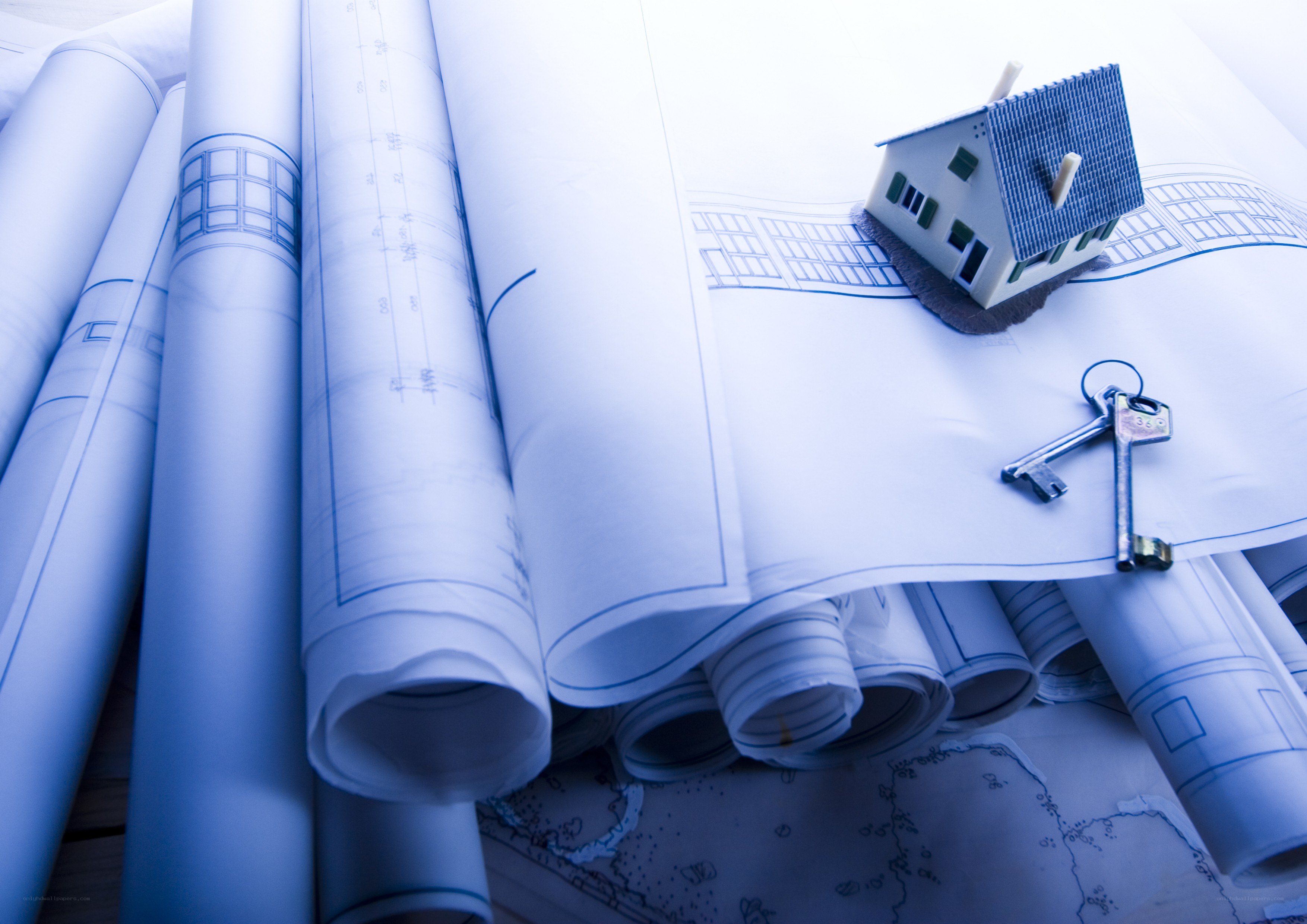 House blueprint with model and keys