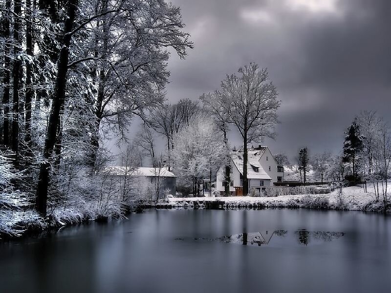 House by Frozen Lake
