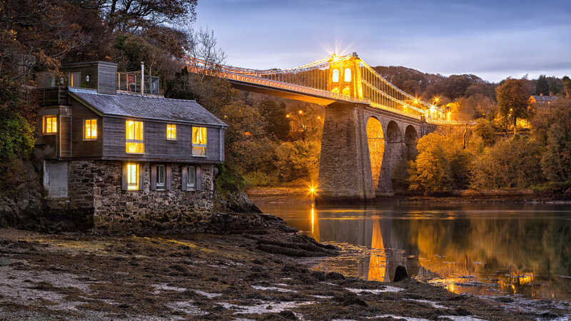House by River at Dusk