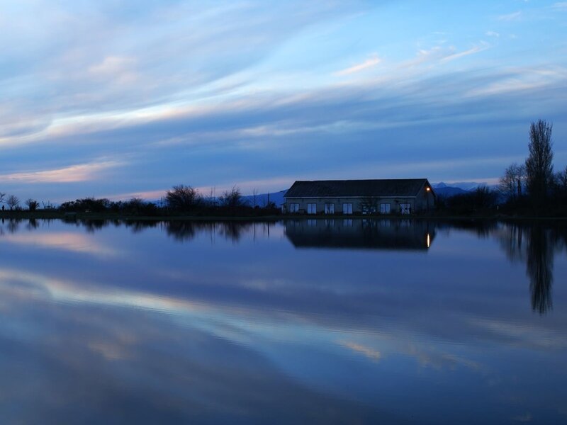 House by the lake at dusk