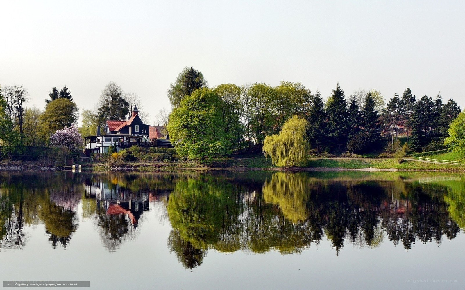House by the lake with reflections