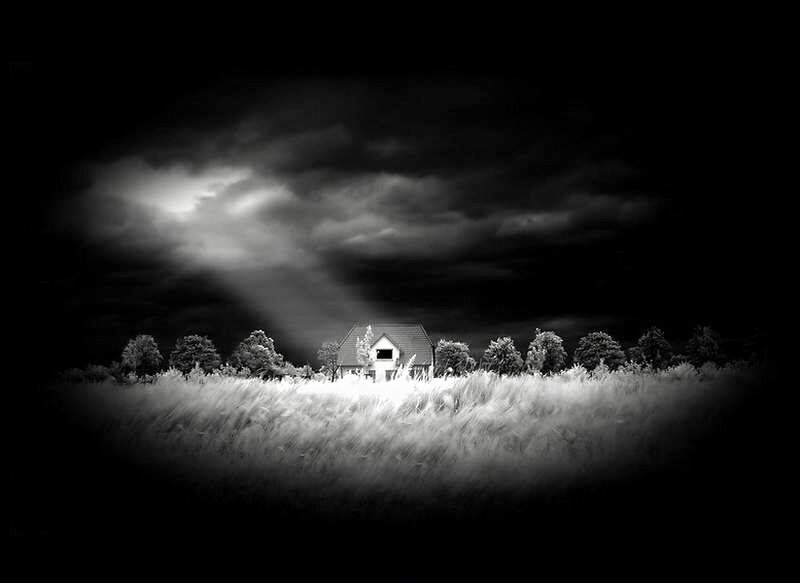 House in a stormy field