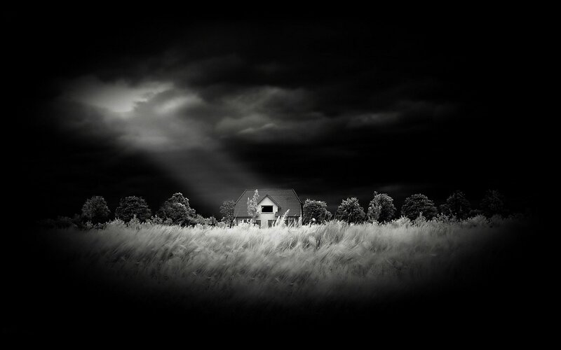 House in Field at Night