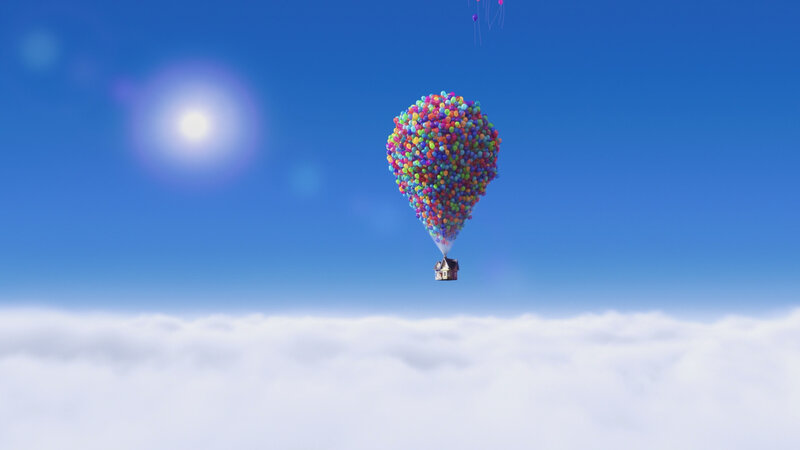 house lifted by balloons