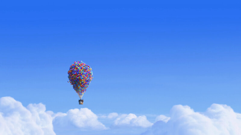 house lifted by balloons