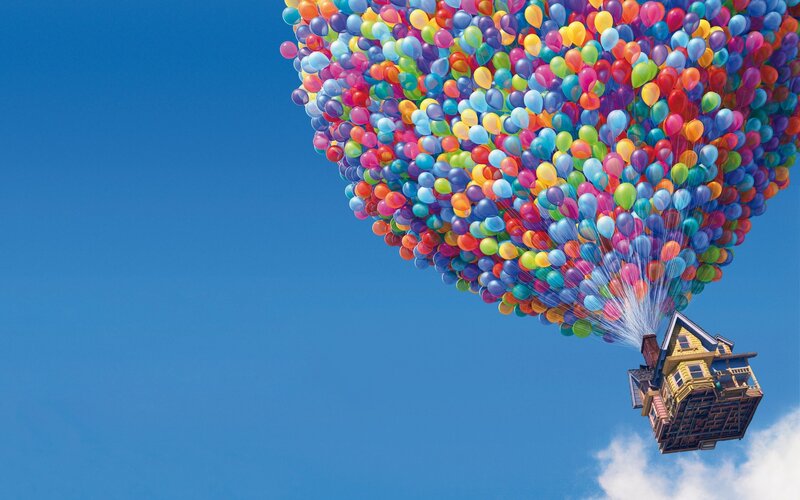 house lifted by balloons