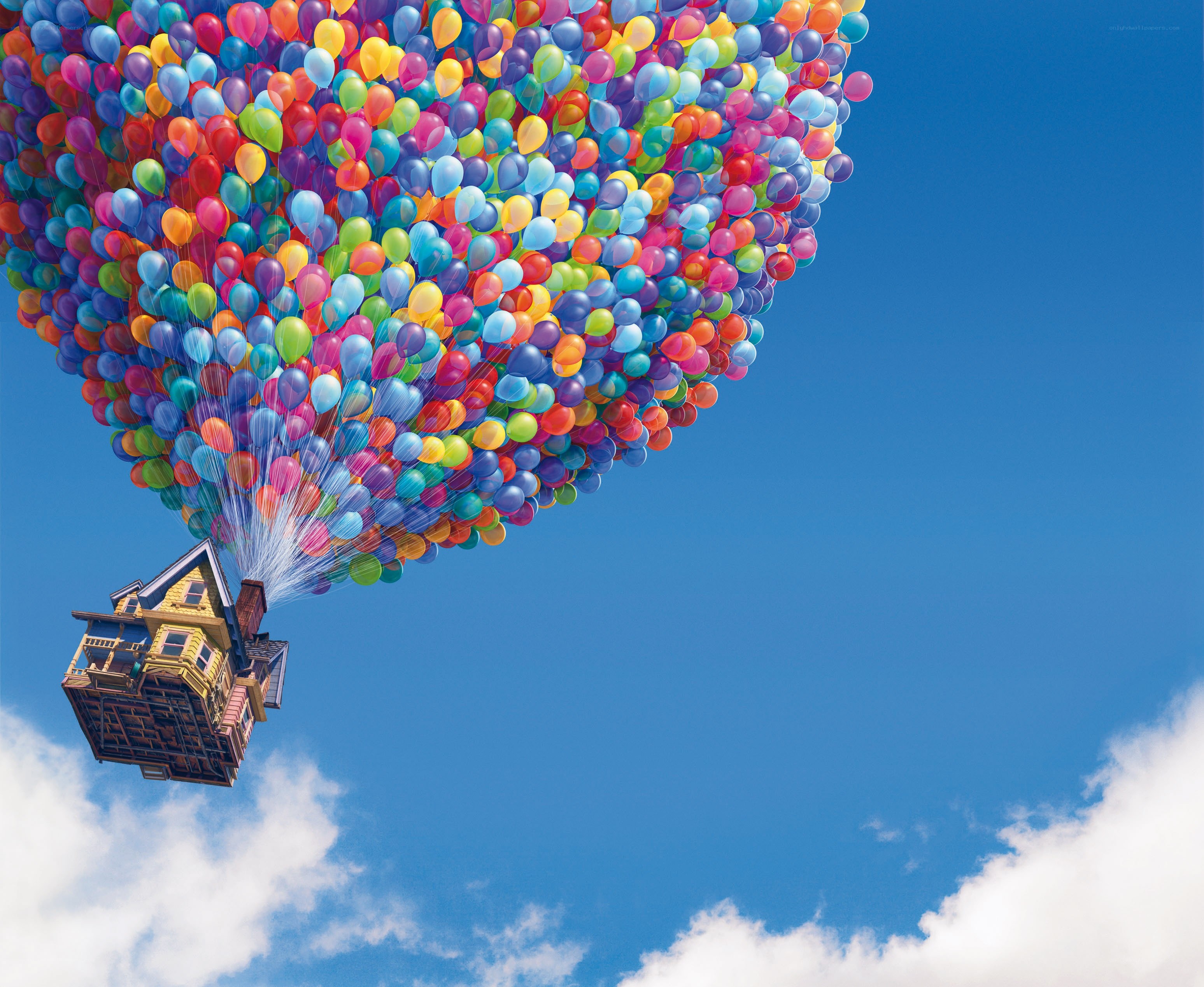 house lifted by balloons