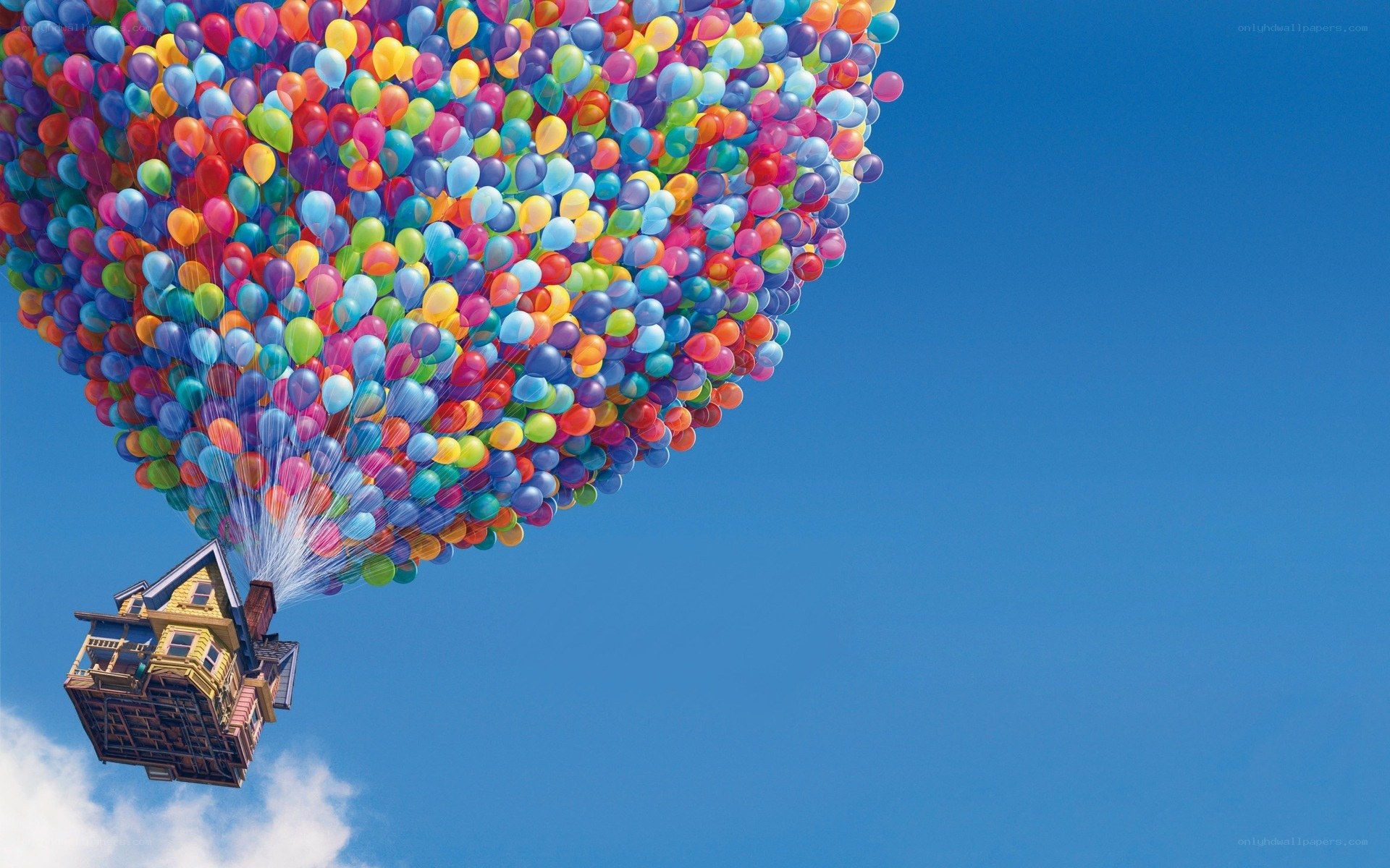 house lifted by balloons