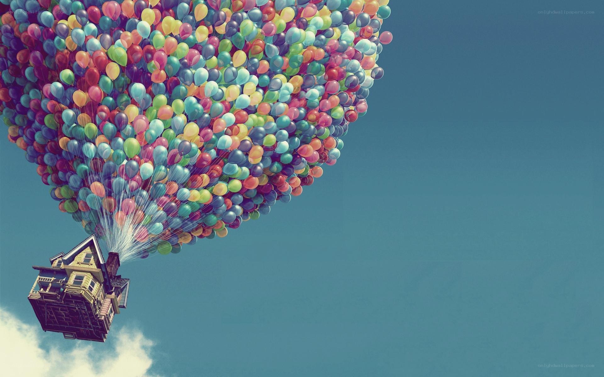 house lifted by balloons